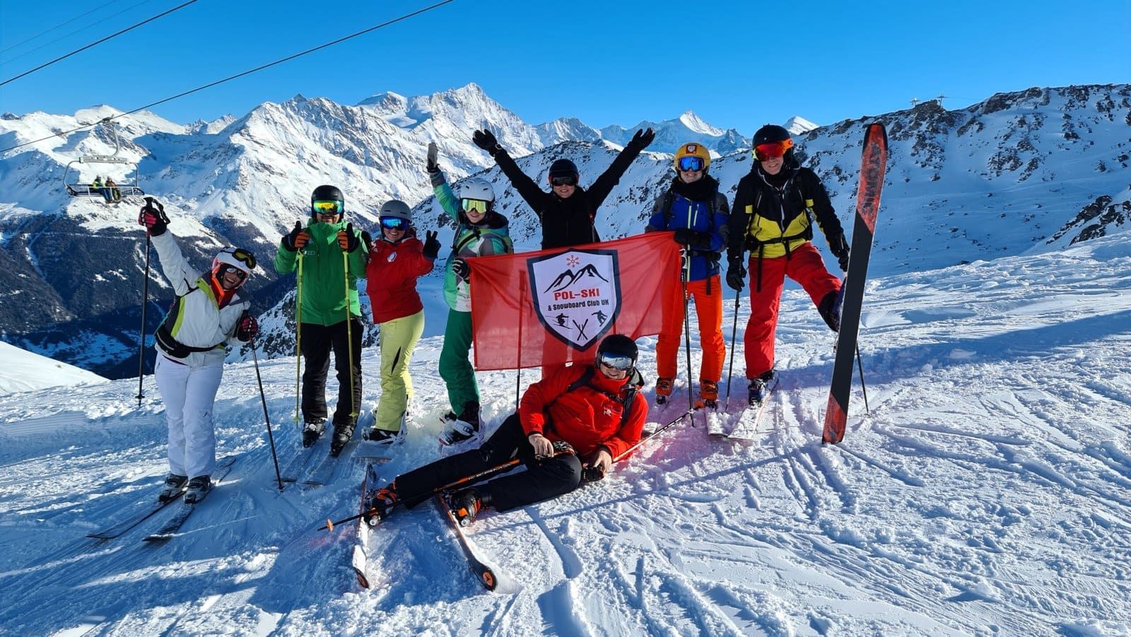 A group with a Pol-Ski flag, Zinal